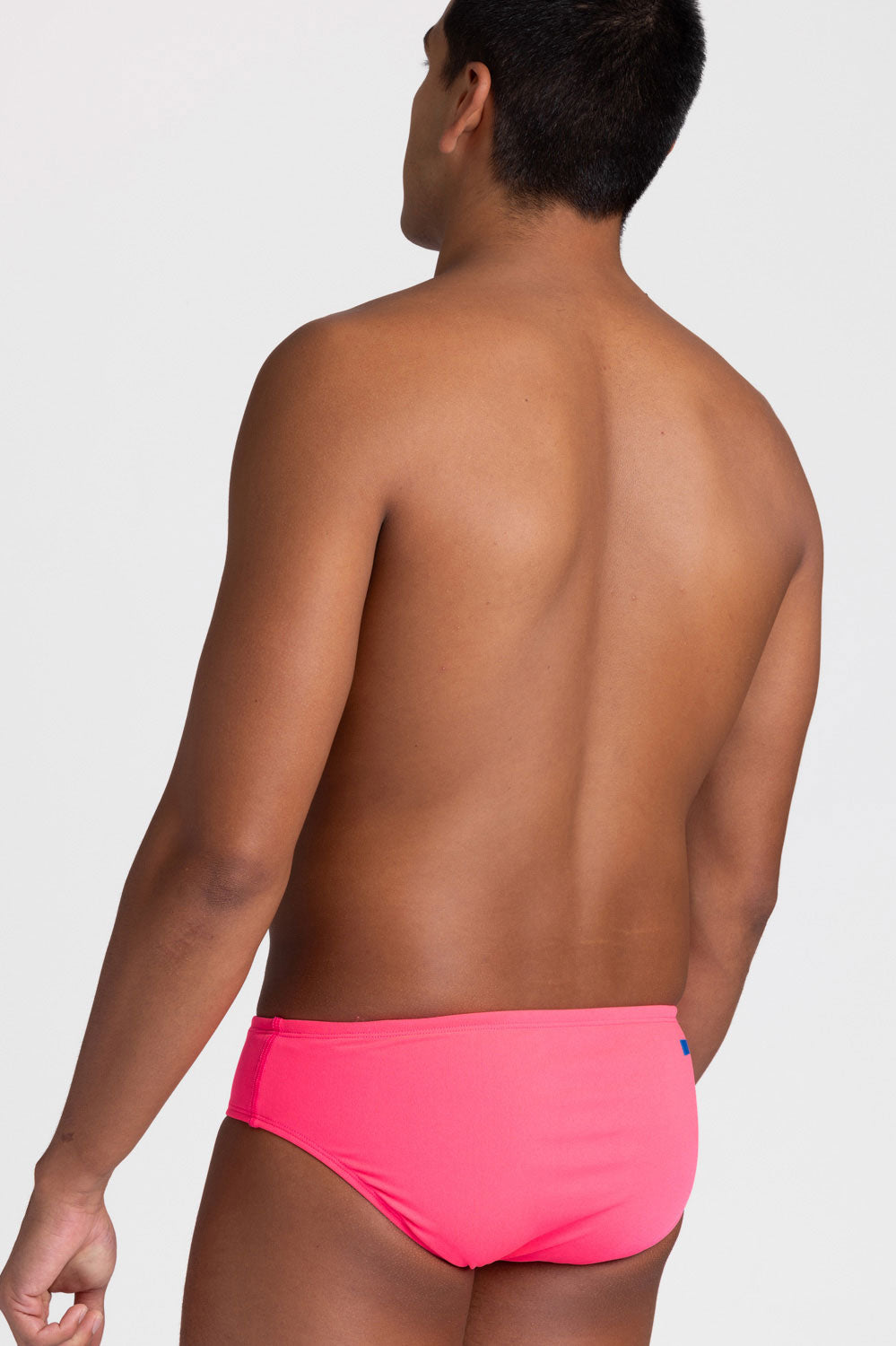 Side view of BROLYN Hot Pink, men's swim brief by JOLYN Australia